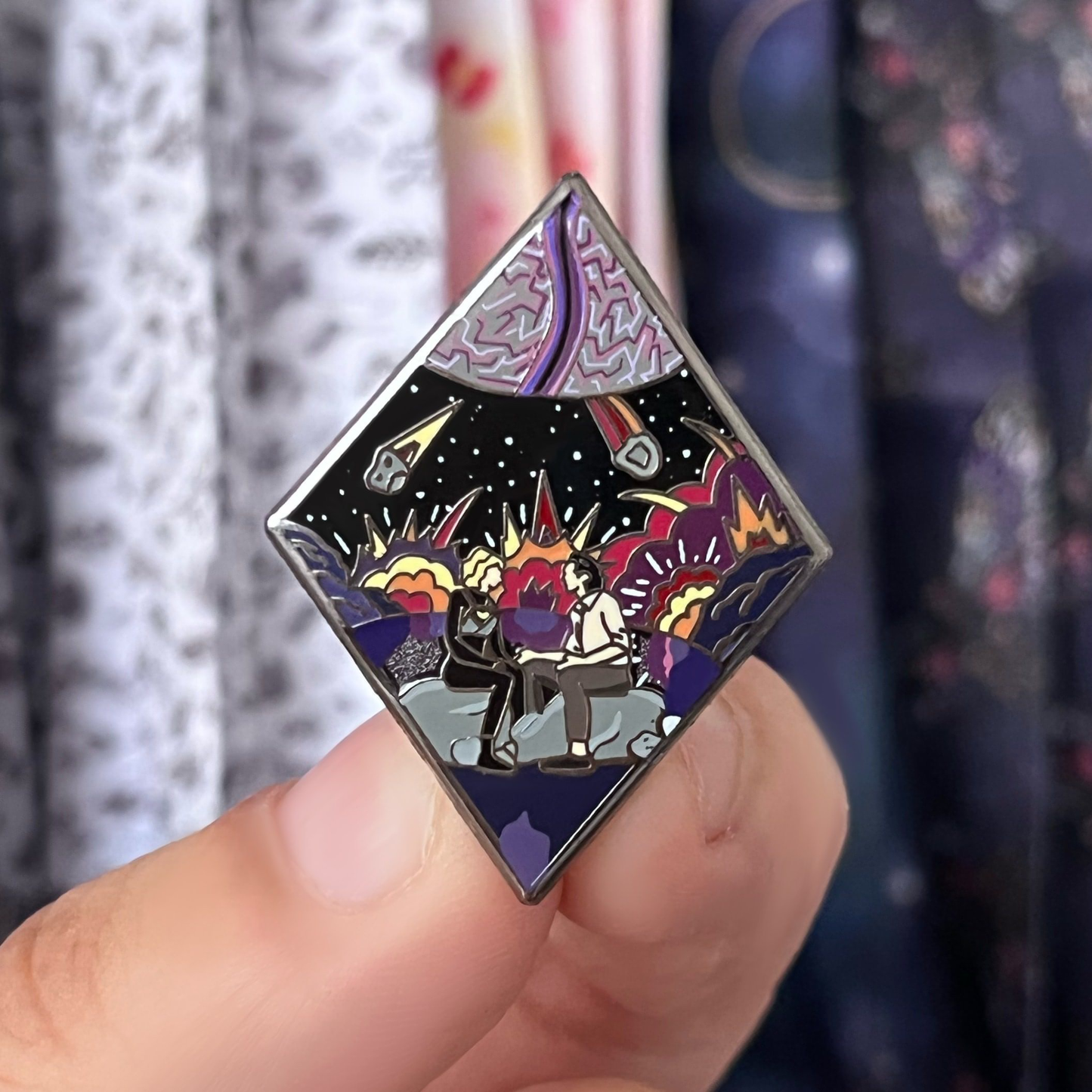 Trickster God Planet Enamel Pin