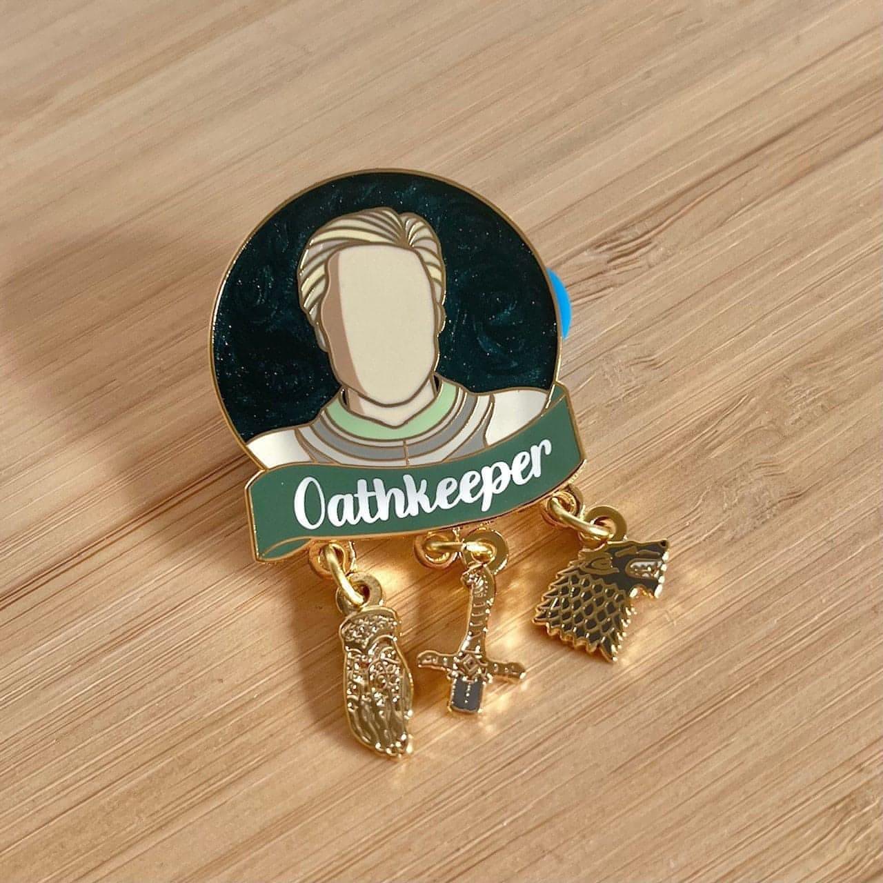 The image shows another angle of the Brienne pin in which the pearl swirl is less shimmery/darker.