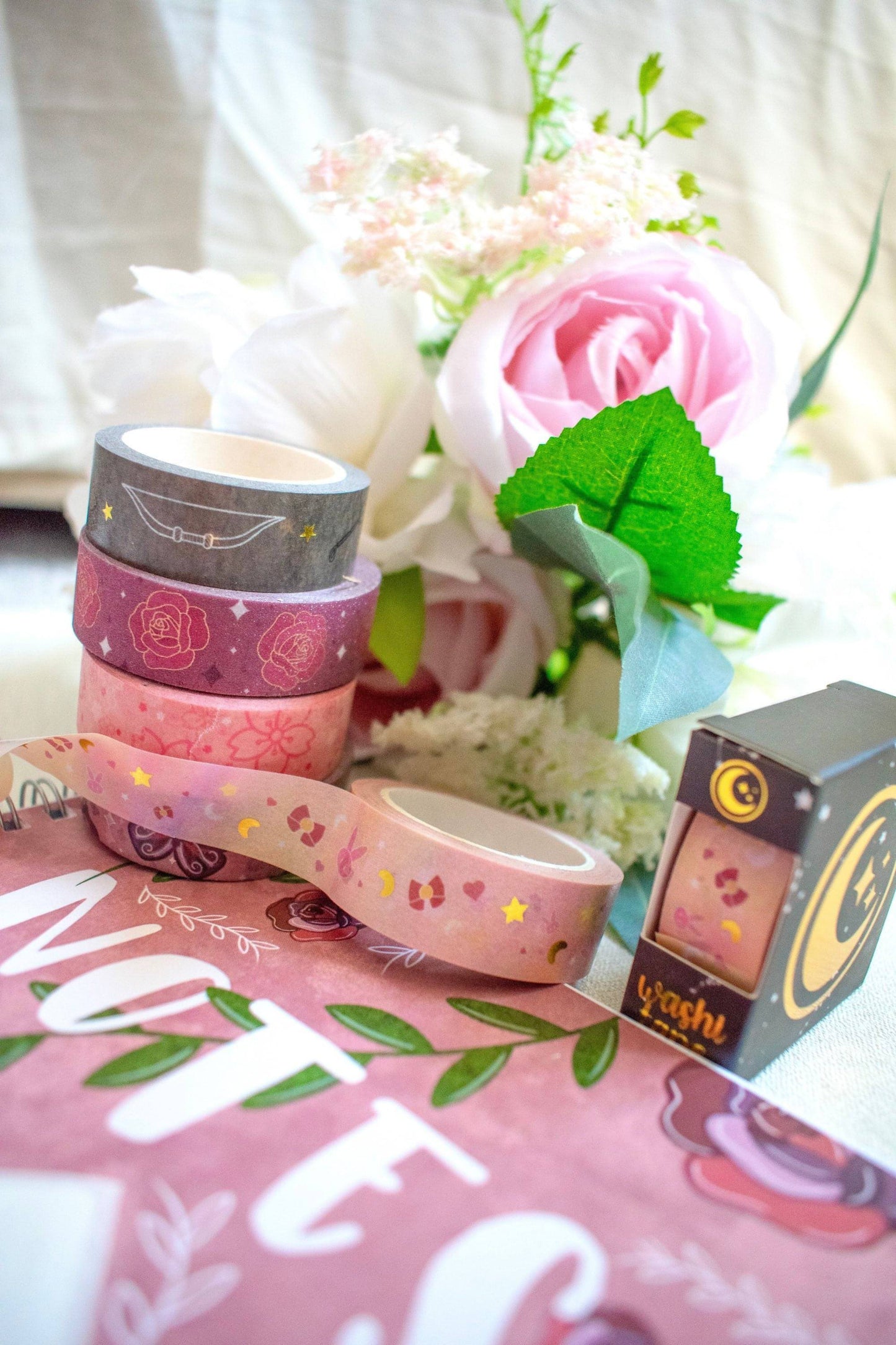 The image shows several different washi tape designs stacked on top of each other to show the variety of products available.